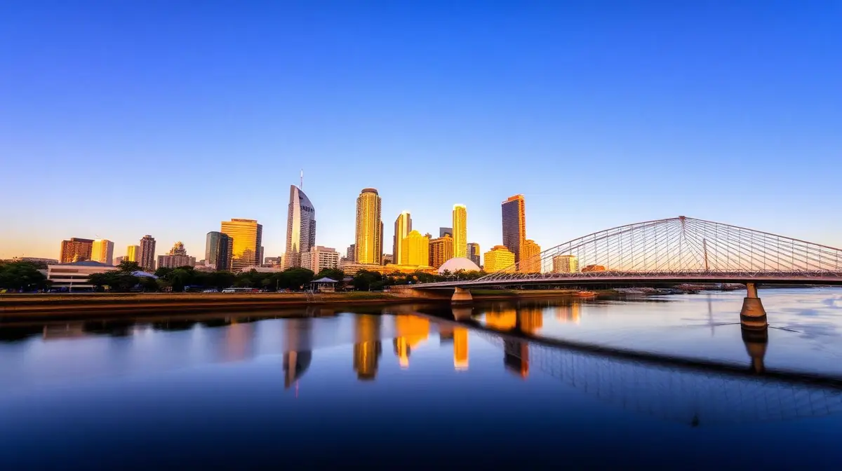 Brisbane skyline at golden hour, Ceejay Intelligence builds custom business software for Brisbane tech, resources and Queensland lifestyle businesses.